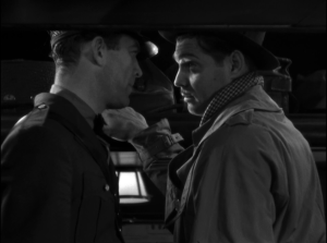 Clark Gable has a quick 'word' with the driver of the bus in 'It Happened One Night'.