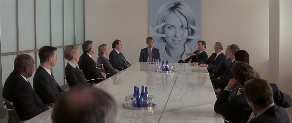 Brand Stand (Jude Law) in a meeting in I Heart Huckabees